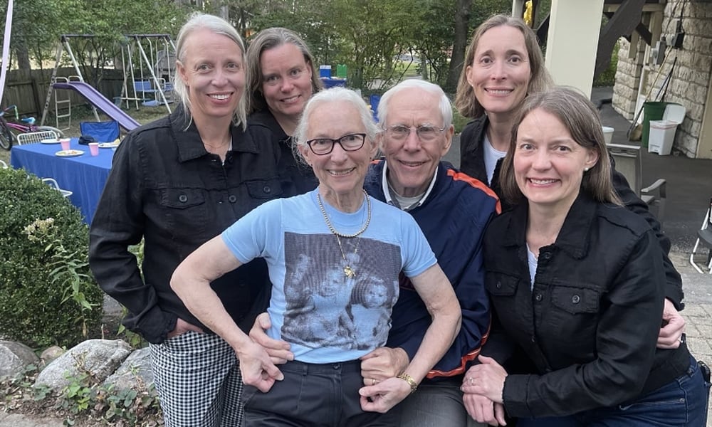 The Dedden quadruplets are seen in birth order from left to right: Katy Deddens Dalrymple, Patty Deddens, Molly Deddens Blumer. Amy Deddens Carter with Ruth and Bob Deddens in the middle. Ruth is wearing a shirt that has a photo of the siblings when they were younger. Bob had it made at a fair from a photo he had in his wallet when the quads were toddlers, and Ruth still has the short. CHARLIE BLUMER/CONTRIBUTED