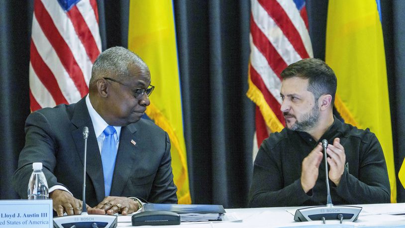 Defense Secretary Lloyd Austin, left and Ukrainian President Volodymyr Zelenskyy look at each other during the Ukraine Contact Group meeting at Ramstein Air Base, Friday, Sept.6, 2024. (Andreas Arnold/dpa via AP)