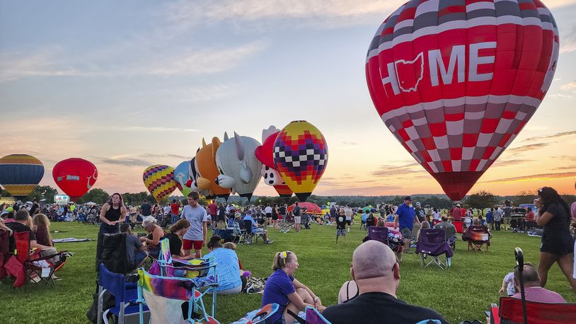 A large crowd gathered for The Ohio Challenge Hot Air Balloon and Skydiving Festival Friday, July 21, 2023 at Smith Park in Middletown. NICK GRAHAM/STAFF