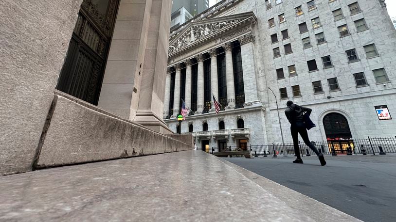 The New York Stock Exchange, rear, is shown on Tuesday, Oct. 8, 2024, in New York. (AP Photo/Peter Morgan, File)