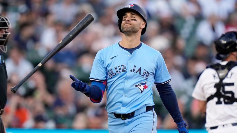 Toronto Blue Jays' Kevin Kiermaier flips his bat after striking out during the fifth inning of a baseball game against the Detroit Tigers, Thursday, May 23, 2024, in Detroit. (AP Photo/Carlos Osorio)