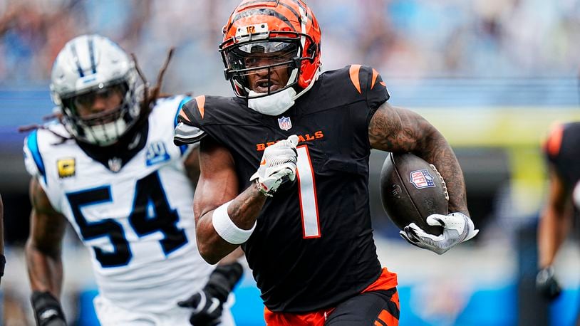 Cincinnati Bengals wide receiver Ja'Marr Chase runs for a touchdown against the Carolina Panthers during the first half of an NFL football game, Sunday, Sept. 29, 2024, in Charlotte, N.C. (AP Photo/Rusty Jones)