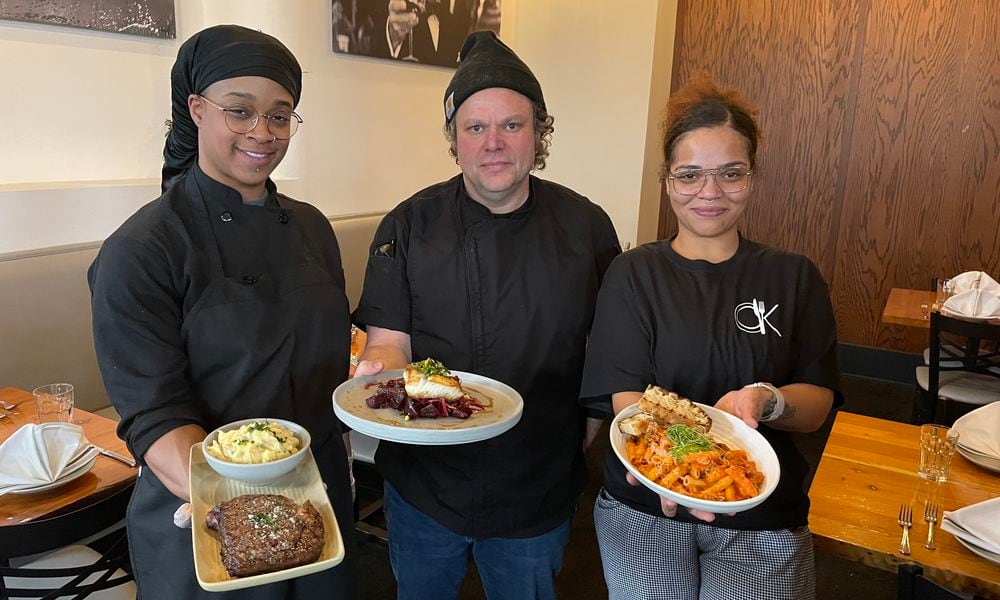 Corner Kitchen is located at 613 E. Fifth St. in Dayton’s Oregon District. Pictured is head cook Bree Copeland, executive chef Gavin St. Denis and sous chef Blessing Henderson. NATALIE JONES/STAFF