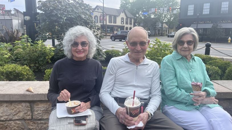 From left, Sue Ann Schirmer and Raymond Schirmer of Kettering, and Betty Baker of Centerville. Sue Ann Schirmer said of Biden's Sunday announcement: “I think, if he didn’t drop out, it would make it easier for Trump to win” (PHOTO: Lillian Ali)