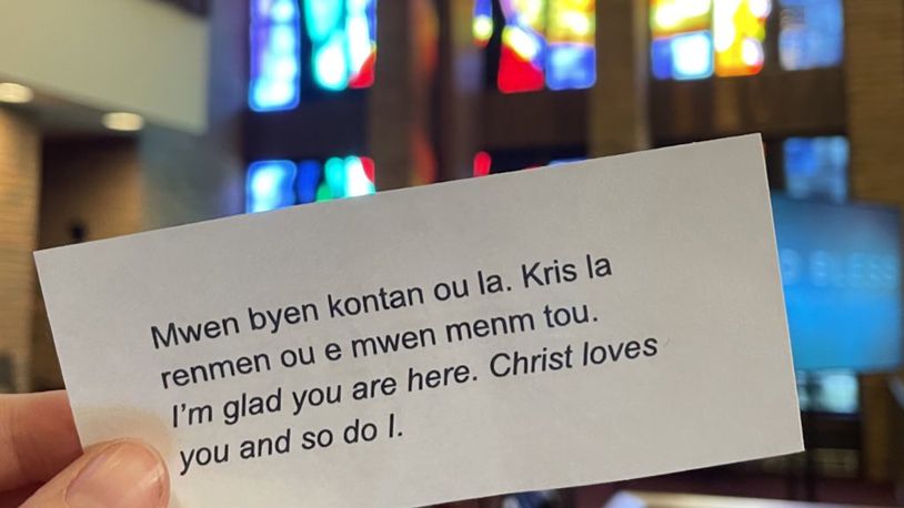 A Springfield church printed off cards to help residents greet their Haitian neighbors in Creole.