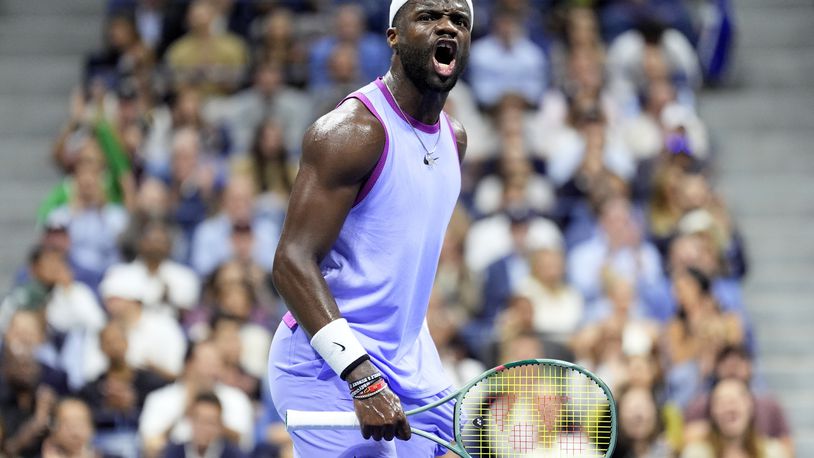 Frances Tiafoe, of the United States, celebrates after winning a point against Grigor Dimitrov, of Bulgaria, during the quarterfinals of the U.S. Open tennis championships, Tuesday, Sept. 3, 2024, in New York. (AP Photo/Eduardo Munoz Alvarez)