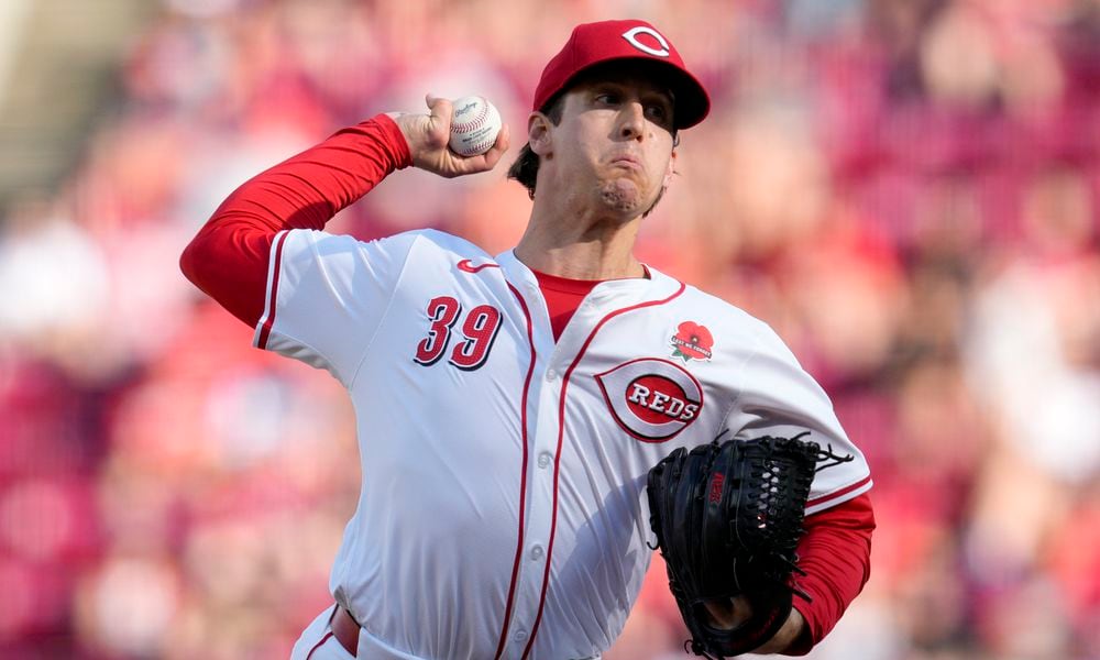 Cincinnati Reds pitcher Lucas Sims throws during the ninth inning of a baseball game against the St. Louis Cardinals, Monday, May 27, 2024, in Cincinnati. (AP Photo/Jeff Dean)