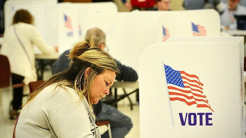 Andrea Heeley votes Tuesday, November 7, 2023 at the St. John the Baptist Catholic Church in Tipp City. MARSHALL GORBY \STAFF