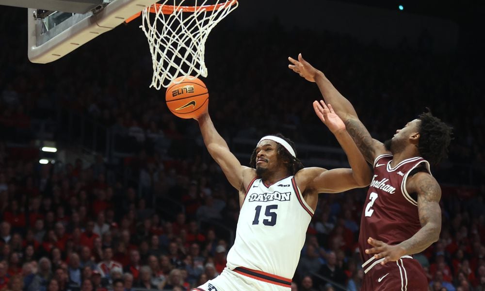 Dayton's DaRon Holmes II dunks against Fordham on Saturday, Feb. 17, 2024, at UD Arena. David Jablonski/Staff