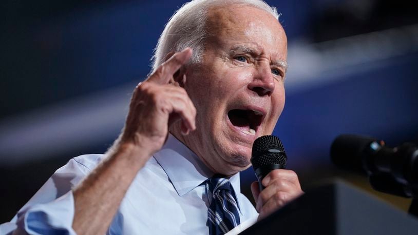 FILE - President Joe Biden speaks during a rally at Richard Montgomery High School, Aug. 25, 2022, in Rockville, Md. A federal judge in Kansas has refused to block nationwide enforcement of a new Biden administration rule requiring firearms dealers to conduct background checks on buyers at gun shows, leaving Texas as the only state so far where a legal challenge has succeeded. (AP Photo/Evan Vucci, File)