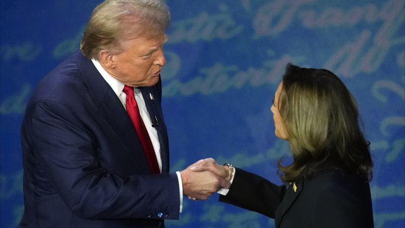 Republican presidential nominee former President Donald Trump shakes hands with Democratic presidential nominee Vice President Kamala Harris during an ABC News presidential debate at the National Constitution Center, Tuesday, Sept.10, 2024, in Philadelphia. (AP Photo/Alex Brandon)