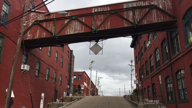 A connecting structure between two of the buildings in the Front Street complex, above East Second Street. The Dayton-Montgomery County Port Authority approved PACE program financing for this site in 2017. THOMAS GNAU/STAFF