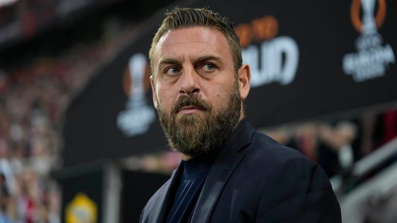 FILE - Roma's head coach Daniele De Rossi waits for the start of the Europa League second leg semi-final soccer match between Leverkusen and Roma at the BayArena in Leverkusen, Germany, Thursday, May 9, 2024. (AP Photo/Matthias Schrader, File)