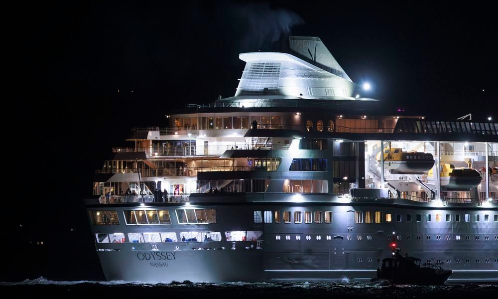 The Villa Vie Odyssey cruise ship leaves Belfast Harbour after the luxury cruise ship became marooned in Belfast, Northern Ireland, for four months due to unexpected repair works, Monday, Sept. 30, 2024. (Liam McBurney/PA via AP)