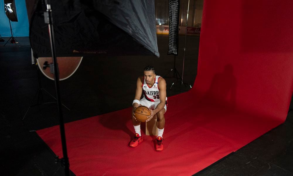 Portland Trail Blazers forward Toumani Camara sits while waiting to get his photo taken during the NBA basketball team's media day in Portland, Ore., Monday, Sept. 30, 2024. (AP Photo/Jenny Kane)