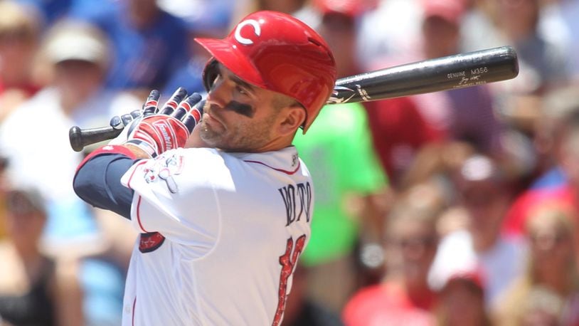 The Reds’ Joey Votto singles against the Cubs on Sunday, July 2, 2017, at Great American Ball Park in Cincinnati. David Jablonski/Staff