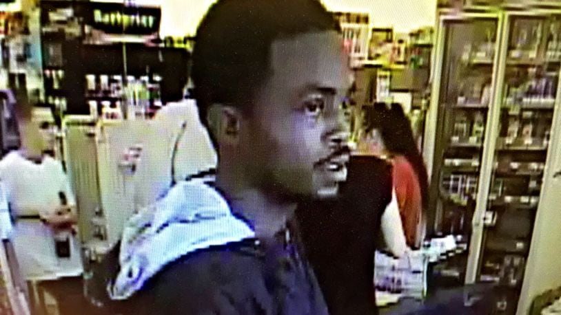 This photo of the man suspected in the Family Dollar armed robbery in Dayton on Monday afternoon, July 4, 2016, was taken from surveillance video, Dayton police said. (Jim Noelker/Staff)