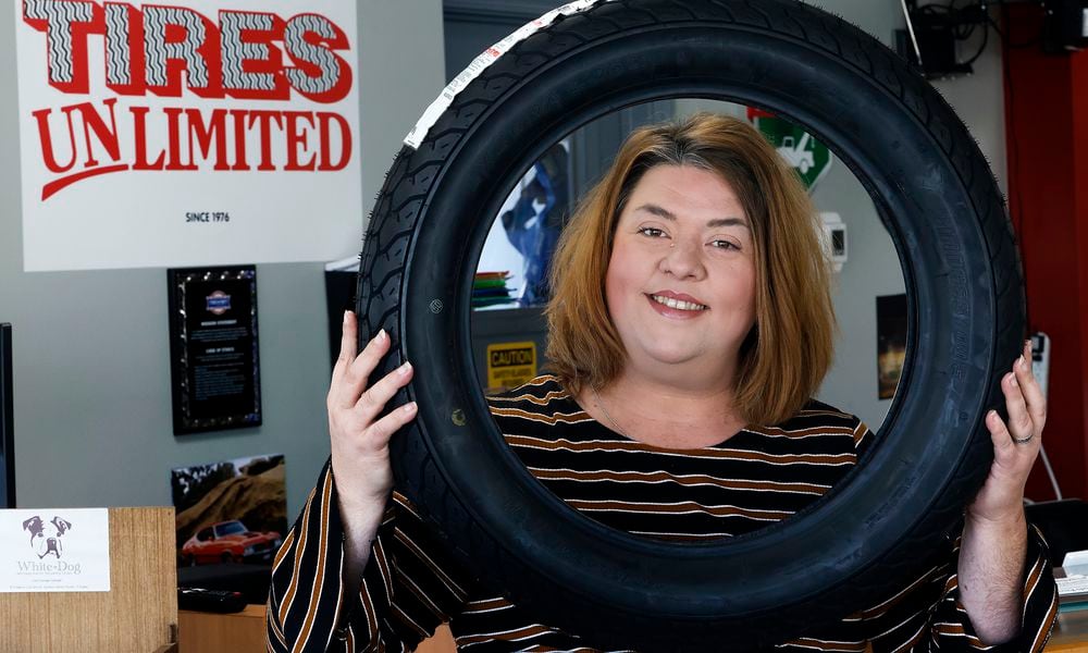 Courtney Carlisle, owner of Moraine's Tires Unlimited located at 3578 Kettering Blvd. in Moraine. MARSHALL GORBY\STAFF