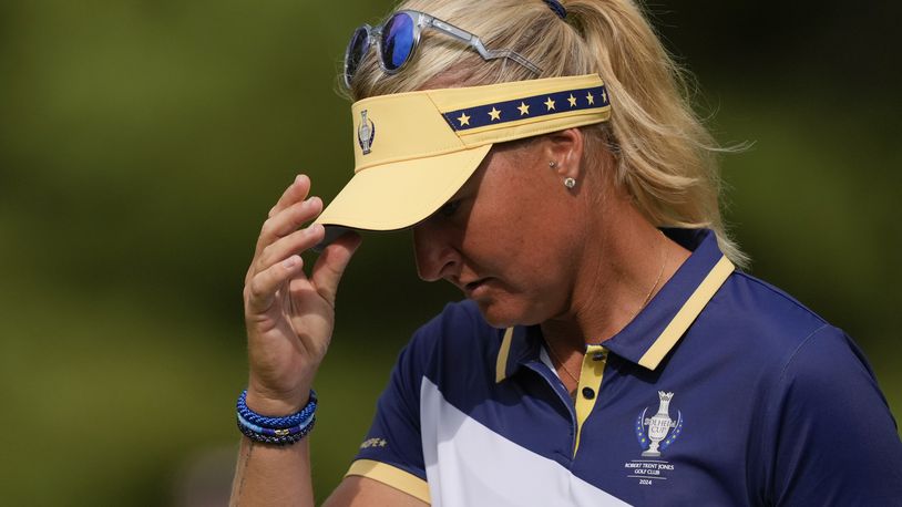 Europe's Vice Captain Anna Nordqvist reacts after missing a putt on the sixth green during a Solheim Cup golf tournament singles match at the Robert Trent Jones Golf Club, Sunday, Sept. 15, 2024, in Gainesville, Va. (AP Photo/Matt York)