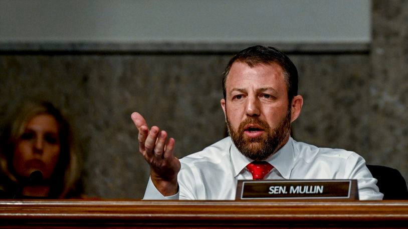 
                        FILE — Sen. Markwayne Mullin (R-Okla.) at the U.S. Capitol in Washington, on March 29, 2023. Party leaders, national security institutionalists and centrists make up the 18 Republicans who have joined Democrats in breaking filibusters against the military aid, defying former President Donald Trump. (Kenny Holston/The New York Times)
                      