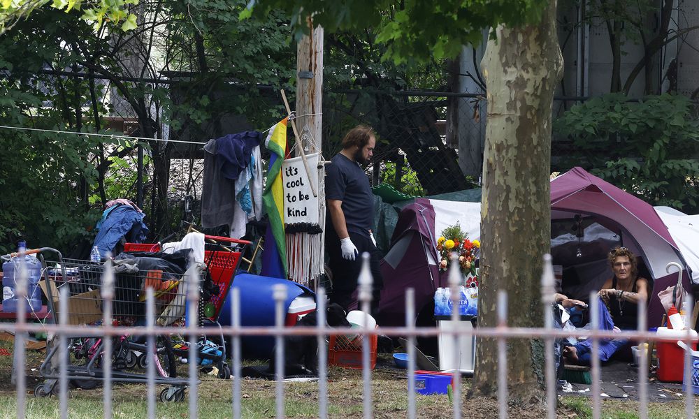 A homeless camp at 423 N. Paul Laurence Dunbar street, in Dayton. MARSHALL GORBY\STAFF