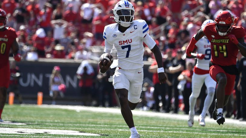 SMU quarterback Kevin Jennings (7) runs away from the Louisville defense to score a touchdown during the first half of an NCAA college football game in Louisville, Ky., Saturday, Oct. 5, 2024. (AP Photo/Timothy D. Easley)