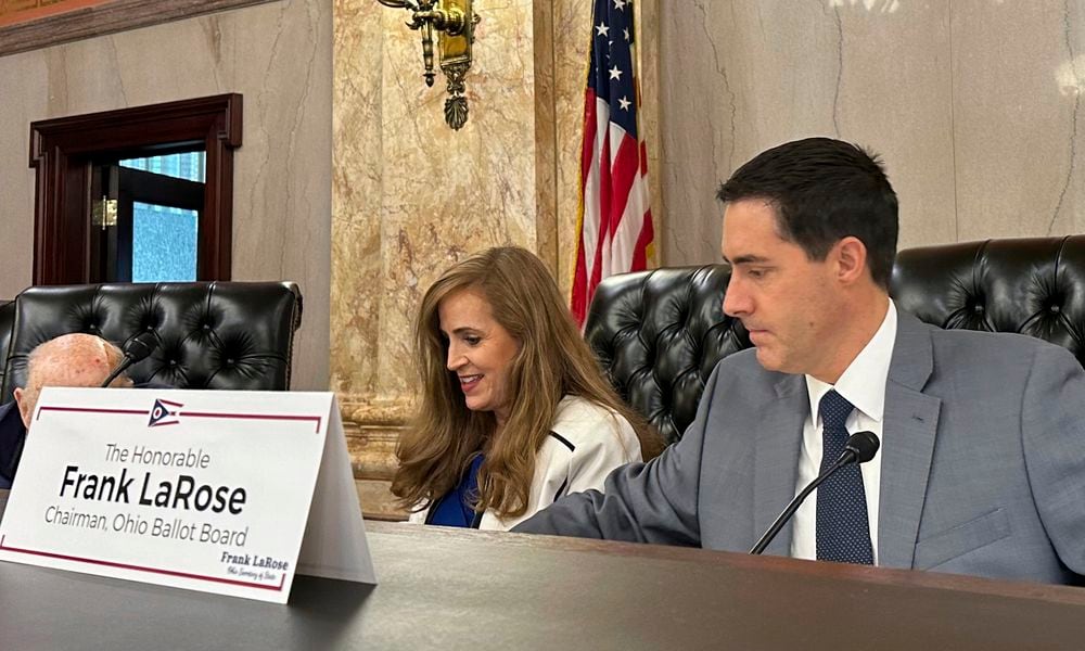 Ohio Secretary of State Frank LaRose, right, and state Sen. Theresa Gavarone prepare for a meeting of the Ohio Ballot Board at the Ohio Statehouse in Columbus, Ohio, Friday, Aug. 16, 2024. (AP Photo/Julie Carr Smyth)