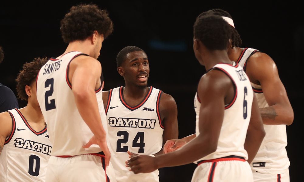 Dayton's Kobe Elvis talks to teammates during a game against Duquesne in the Atlantic 10 Conference tournament quarterfinals on Thursday, March 14, 2024, at the Barclays Center in Brooklyn, N.Y. David Jablonski/Staff