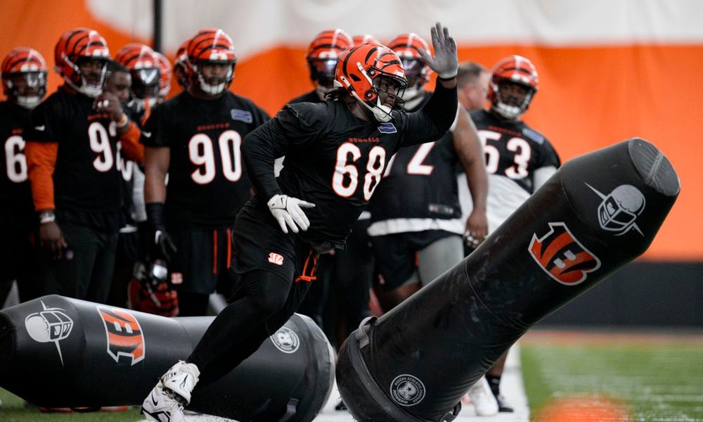 Cincinnati Bengals defensive tackle McKinnley Jackson (68) performs a drill during an NFL football practice, Tuesday, June 11, 2024, in Cincinnati. (AP Photo/Jeff Dean)