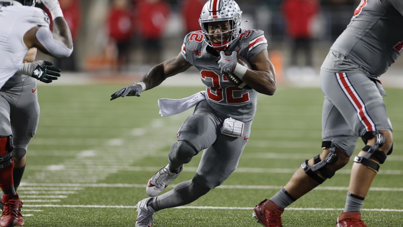 FILE - Ohio State running back TreVeyon Henderson plays against Michigan State during an NCAA college football game Saturday, Nov. 11, 2023, in Columbus, Ohio. TreVeyon Henderson said Wednesday, Dec. 27, 2023 that he would play when Buckeyes (11-1) play Missouri (10-2) in the Cotton Bowl.(AP Photo/Jay LaPrete, File)