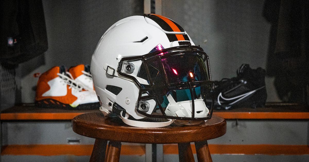 Browns new/old white helmets: Darcy cartoon 