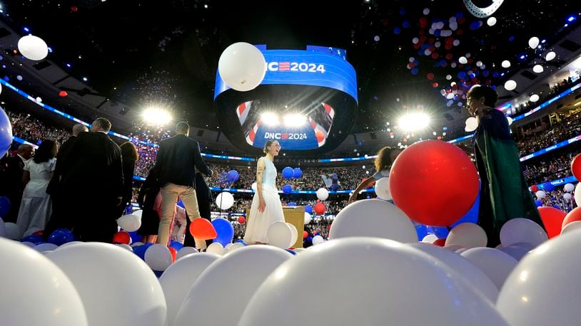 Balloons drop onto stage after Democratic presidential nominee Vice President Kamala Harris spoke on the final night of the Democratic National Convention in Chicago, Thursday, Aug. 22, 2024. (Kent Nishimura/The New York Times via AP, Pool)