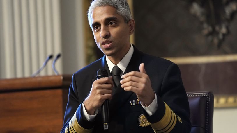 FILE - Surgeon General Dr. Vivek Murthy speaks during an event on the White House complex in Washington, April 23, 2024. Murthy is asking Congress to require warning labels on social media platforms that are similar to those that appear on cigarette boxes. (AP Photo/Susan Walsh, File)