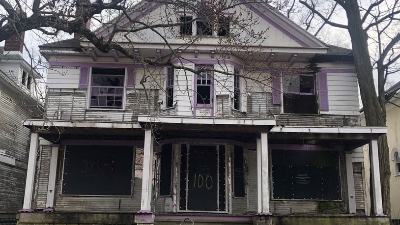 A vacant and falling apart home in north Dayton. CORNELIUS FROLIK / STAFF