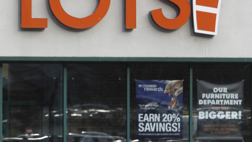 FILE - A shopper leaves the Big Lots store on Dec. 4, 2012 in Berlin, Vt. (AP Photo/Toby Talbot, file)