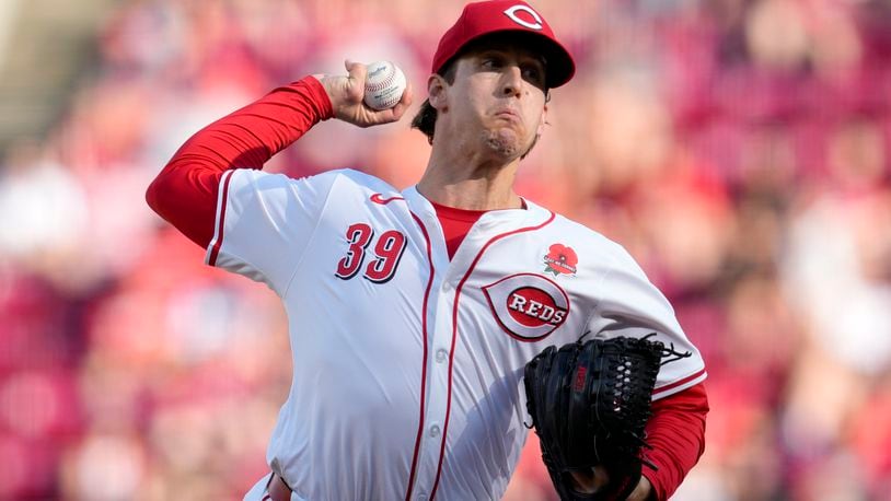 Cincinnati Reds pitcher Lucas Sims throws during the ninth inning of a baseball game against the St. Louis Cardinals, Monday, May 27, 2024, in Cincinnati. (AP Photo/Jeff Dean)