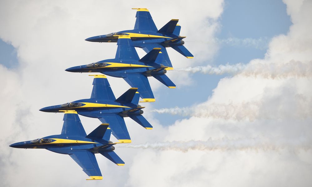 The U.S. Navy Blue Angels flight team performs at the Dayton Air Show on Sunday June 23, 2024. MARSHALL GORBY / STAFF