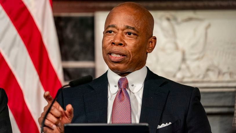 FILE - Mayor Eric Adams speaks during a press conference at City Hall in New York, Dec. 12, 2023. (AP Photo/Peter K. Afriyie, File)