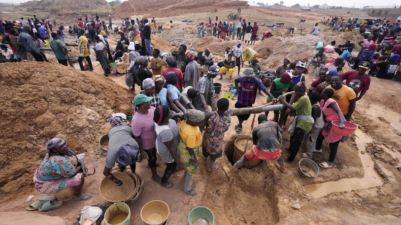 Miners work at an illegal tin mining site in Jos, Nigeria, Wednesday, April 3, 2024. The recent arrests come as Nigeria seeks to regulate mining of critical minerals, curb illegal activity and better benefit from its mineral resources. (AP Photo/Sunday Alamba)