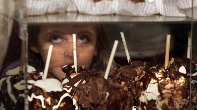 A display of buckeyes and chocolate covered apples during a previous Chocolate Festival at the Montgomery County Fairgrounds. STAFF FILE PHOTO