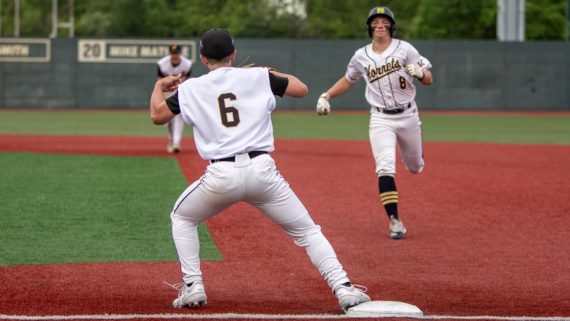 Centerville first baseman Jackson Clark catches a throw from left fielder Colten Burleson to double Monroe's Tyler Gannon off first base for a game-ending double play Friday at Wright State. Jeff Gilbert/CONTRIBUTED