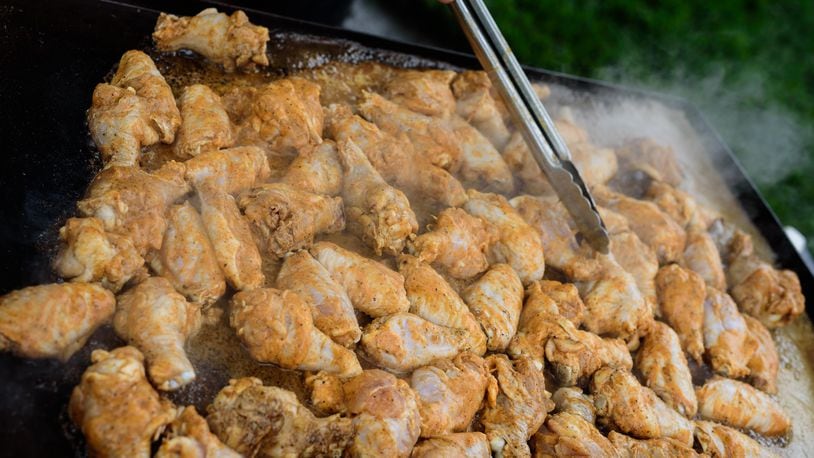 The Kickin’ Chicken Wing Fest, hosted by the Miami Valley Restaurant Association, will take place Saturday, July 13 at Fraze Pavilion. TOM GILLIAM / CONTRIBUTING PHOTOGRAPHER