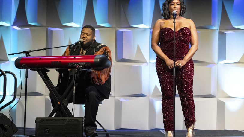 Michael Trotter Jr., left, and Tanya Blount of The War and Treaty perform during Country Radio Seminar on Thursday, Feb. 29, 2024, in Nashville, Tenn. (Photo by Amy Harris/Invision/AP)