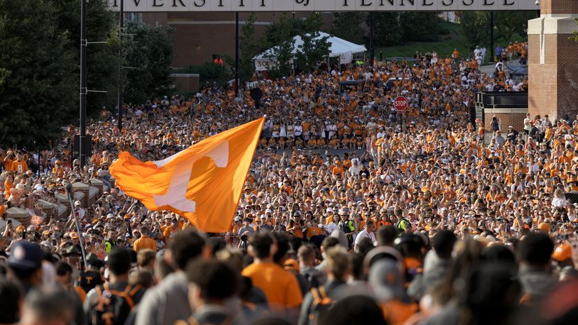 Tennessee fans gather outside Neyland Stadium before an NCAA college football game between Tennessee and Kent State, Saturday, Sept. 14, 2024, in Knoxville, Tenn. (AP Photo/George Walker IV)