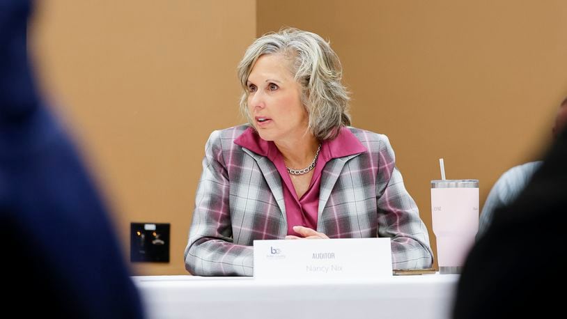 Butler County Commissioners, public officials and lawmakers gathered for another summit on dealing with the property value hike Monday, Sept. 18, 2023 at Butler county Government Services Center in Hamilton. Butler County Auditor Nancy Nix speaks during the event. NICK GRAHAM/STAFF 