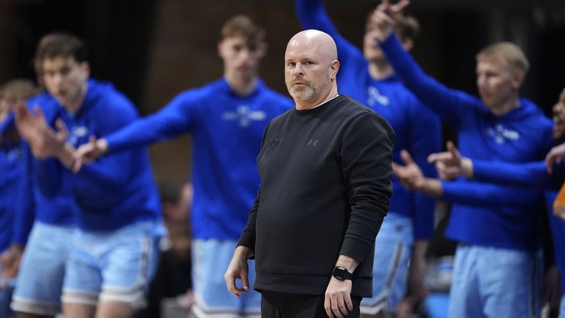 Indiana State coach Josh Schertz watches from the bench during the first half of an NCAA college basketball game against Utah in the semifinals of the NIT, Tuesday, April 2, 2024, in Indianapolis. (AP Photo/Michael Conroy)