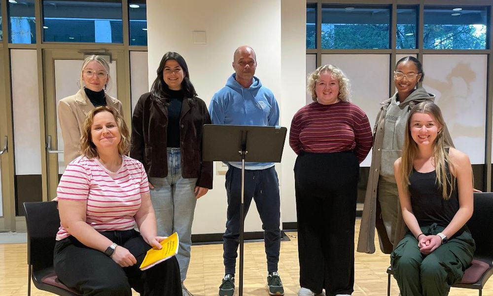 First row left to right: Gina Handy Minyard (Heidi) and Sierra Jobman (Debater); Back row left to right: Shay Roth (Debater), Meg Adams (Debater), Robb Willoughby (Legionnaire), Atlas Kessinger (Debater), and Nya Lewis (Debater) will appear in Magnolia Theatre Company's production of 