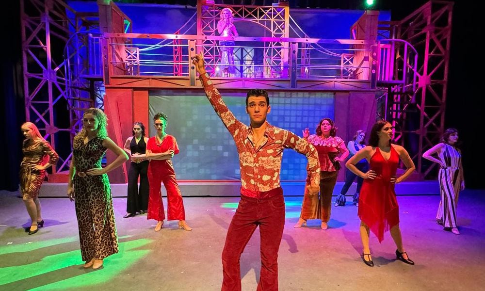 Nick Valle (Tony Manero) and the cast of La Comedia Dinner Theatre's production of 