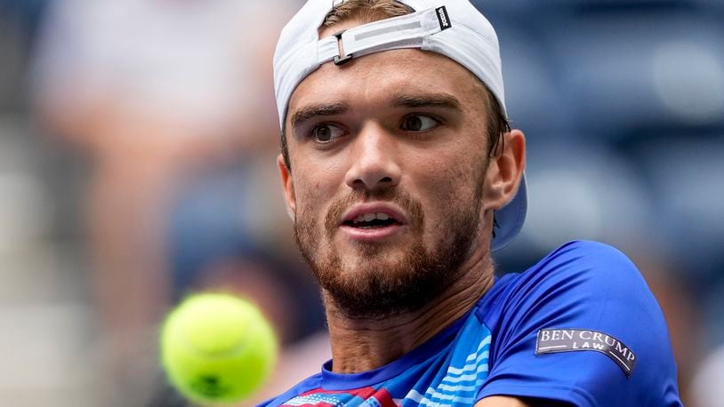 Tomas Machac, of the Czech Republic, returns a shot to Sebastian Korda, of the United States during the second round of the U.S. Open tennis championships, Thursday, Aug. 29, 2024, in New York. (AP Photo/Kirsty Wigglesworth)