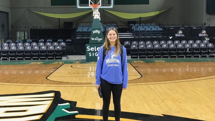 Wright State's Ellie Magestro Kennedy at center court of the Nutter Center. Tom Archdeacon/CONTRIBUTED